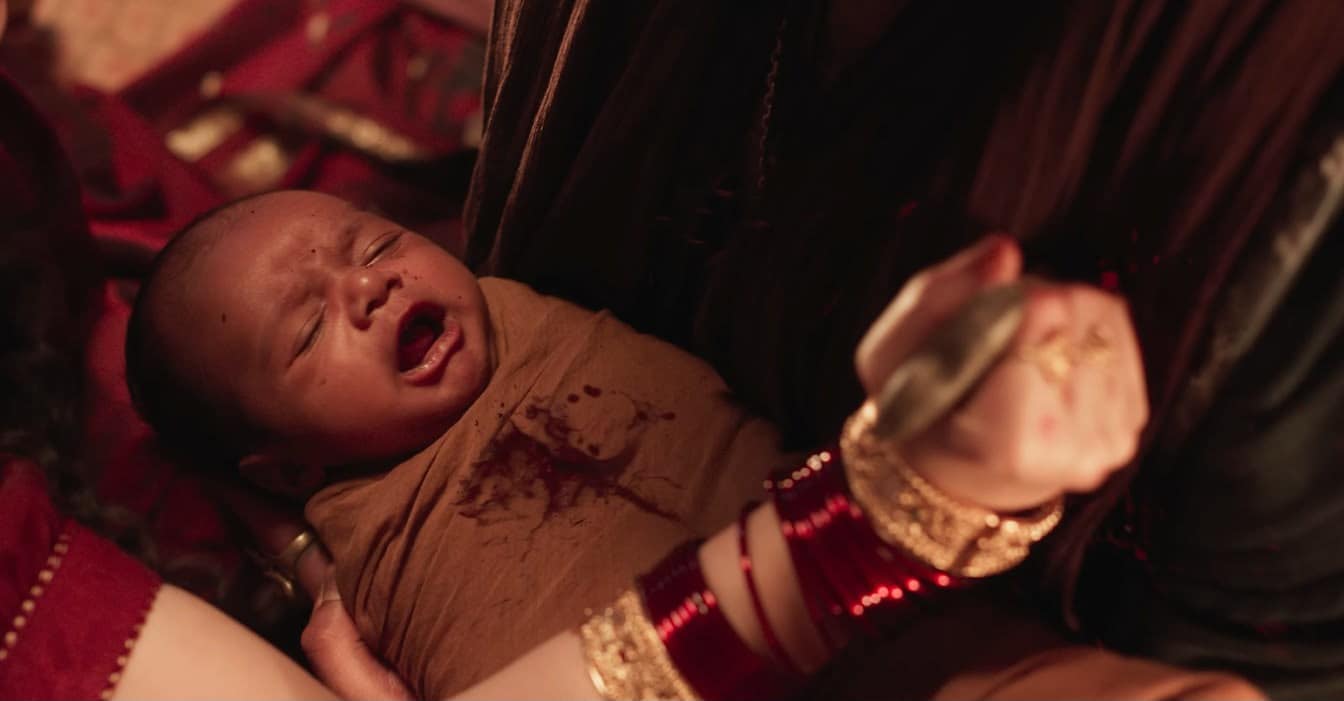 One of the trailer’s most unsettling frames shows a person holding a baby as they are stabbed, with blood splattered across the child. Is the baby Raya? Or could it be Ticket? The disturbing glimpse could hold a key clue to the characters’ past and the larger mystery of Toxic. One of the trailer’s most unsettling frames shows a person holding a baby as they are stabbed, with blood splattered across the child. Is the baby Raya? Or could it be Ticket? The disturbing glimpse could hold a key clue to the characters’ past and the larger mystery of Toxic.