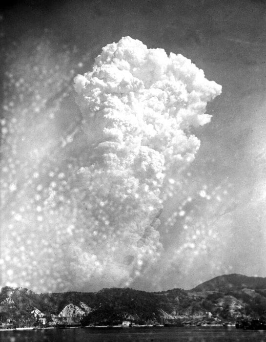 A massive column of smoke rises over Hiroshima after the US dropped the “Little Boy” atomic bomb on August 6, 1945, during World War II. (Image: AP file)