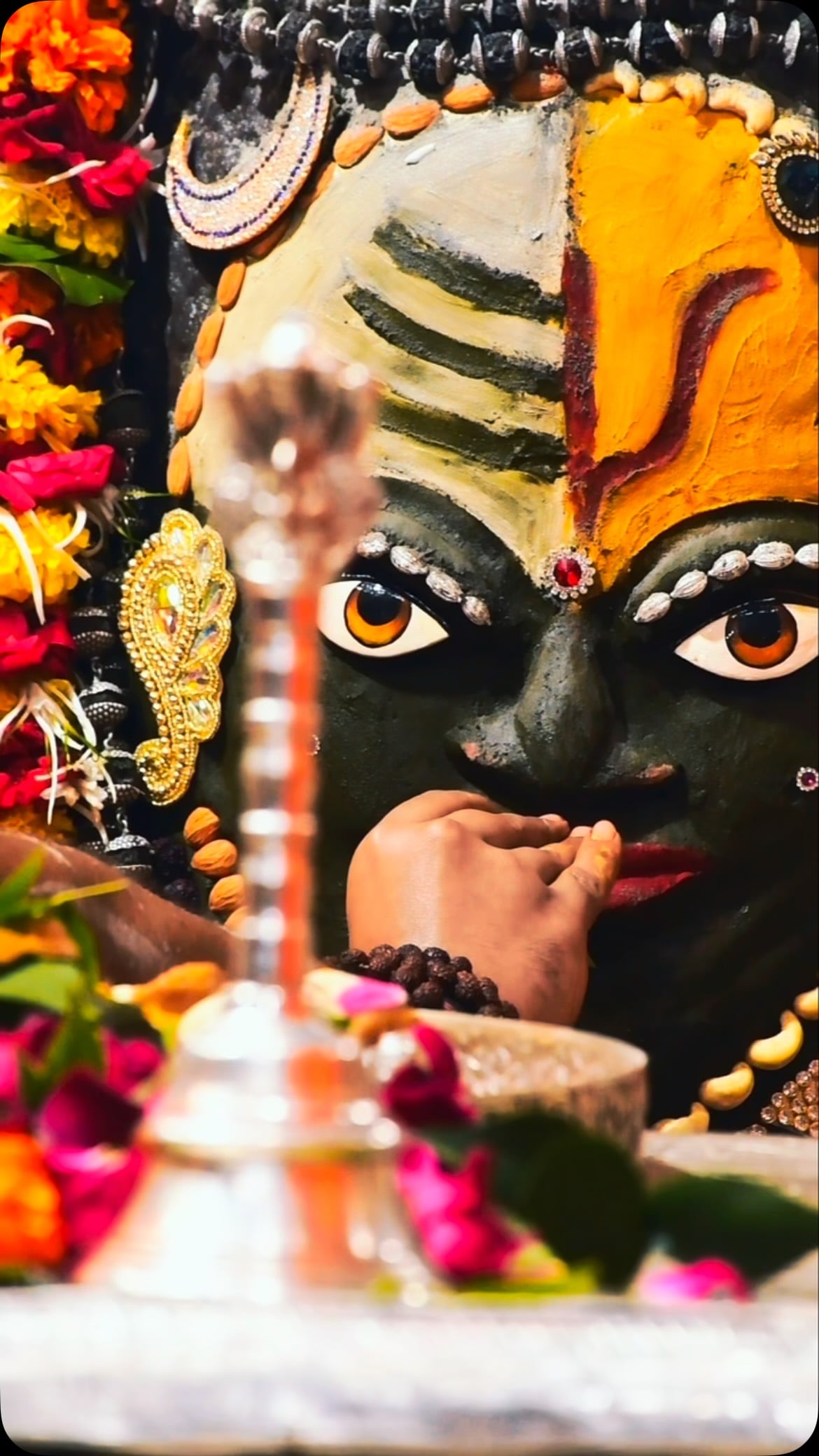 The imagery at Nagchandreshwar is unusual because Lord Shiva and Goddess Parvati are shown seated on the serpent itself. The shrine's iconography also includes other figures associated with the divine family and serpent worship. (Image: shri.mahakaleshwar.ujjain/Instagram)