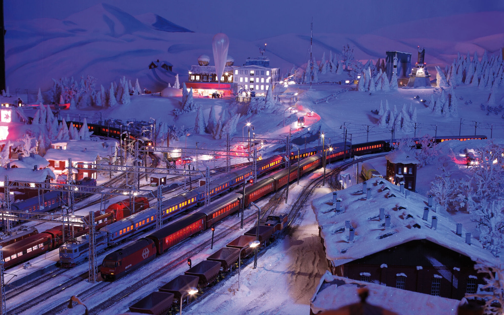 Situated in Hamburg's historic Speicherstadt warehouse district, Miniatur Wunderland holds the official record for the world's largest model railway layout. Its current track system stretches for around 16.5 km, while the model layout covers nearly 1,700 square metres. The attraction has over 1,200 trains, more than 12,000 rail cars and thousands of buildings and figures.