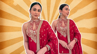 Rakul Preet Singh is giving festive dressing a glamorous upgrade in a rich red Gopi Vaid creation, with intricate embroidery, a statement neckline and plenty of sparkle.