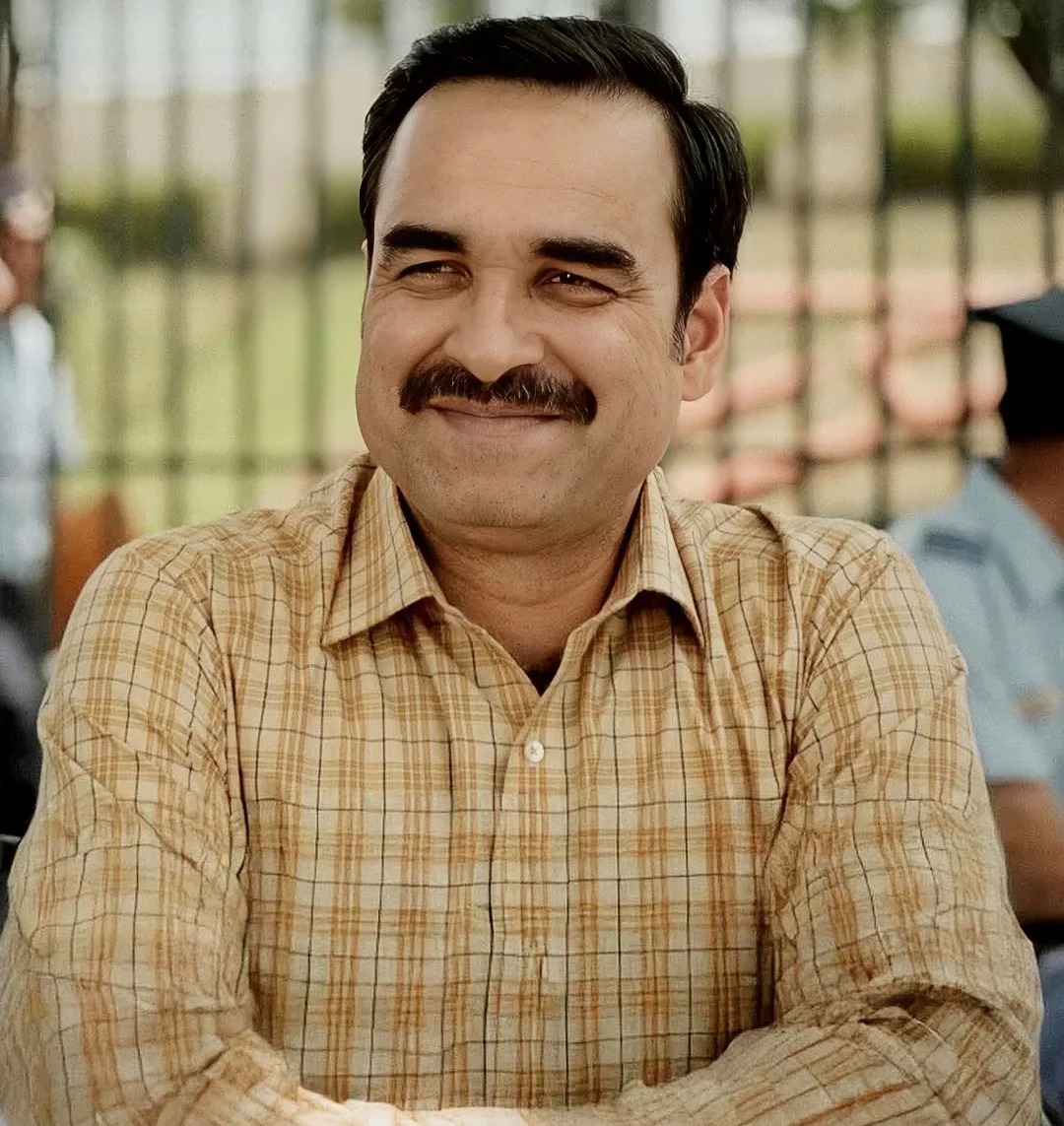 Masaan (2015): Tripathi shines as Sadhya Ji, a gentle, soft-spoken railway employee who brings warmth and quiet companionship to Devi’s life. His tender performance provides a heartwarming, poignant contrast to the film’s tragic themes surrounding grief and social taboos. Masaan (2015): Tripathi shines as Sadhya Ji, a gentle, soft-spoken railway employee who brings warmth and quiet companionship to Devi’s life. His tender performance provides a heartwarming, poignant contrast to the film’s tragic themes surrounding grief and social taboos.