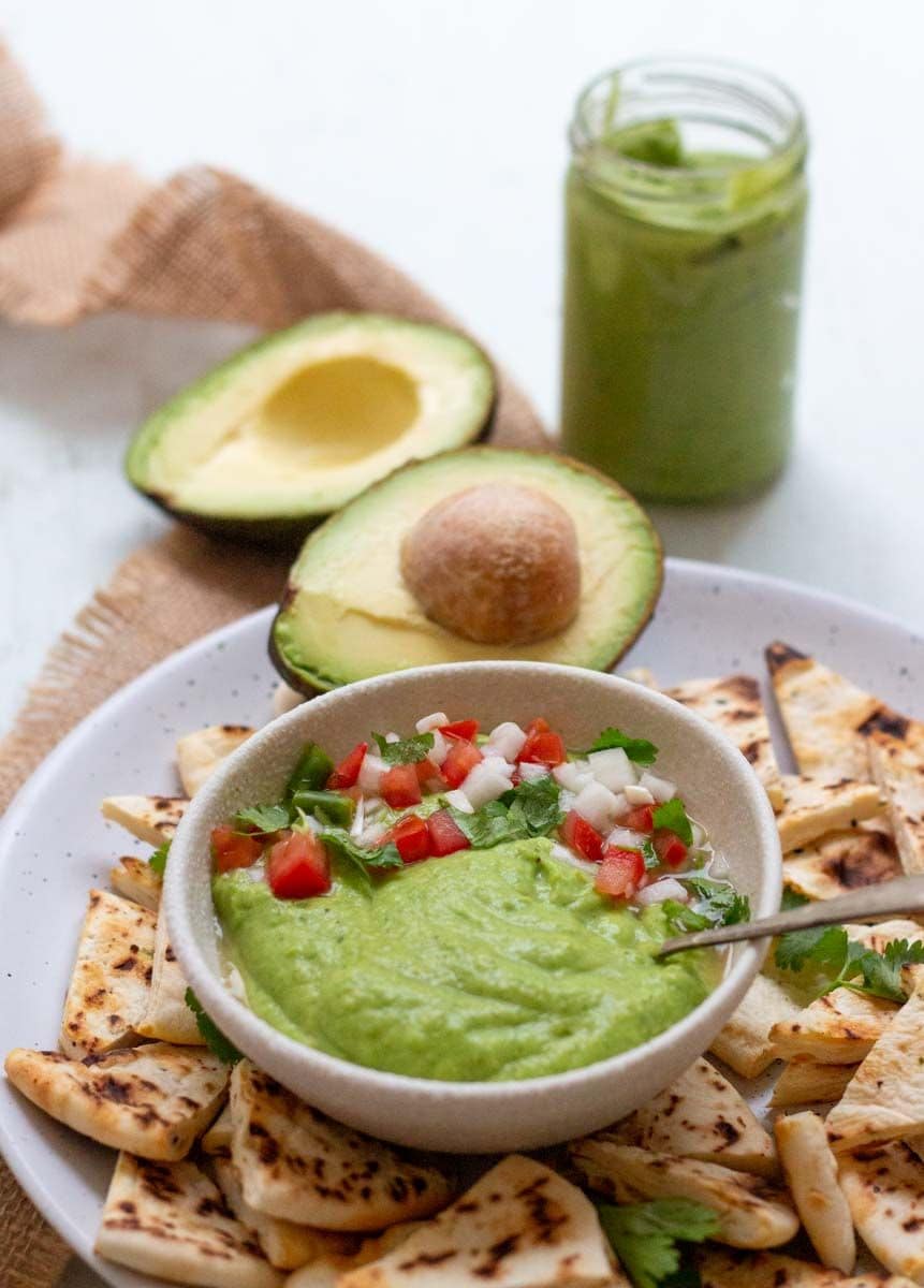 Kashmiri Avocado Chutney: Inspired by regional walnut dip traditions, this lush condiment blends ripe avocado with thick curd, garlic, mint, and Kashmiri chilli powder. It delivers a rich, velvety texture that pairs exceptionally well with roasted proteins or grilled vegetables.