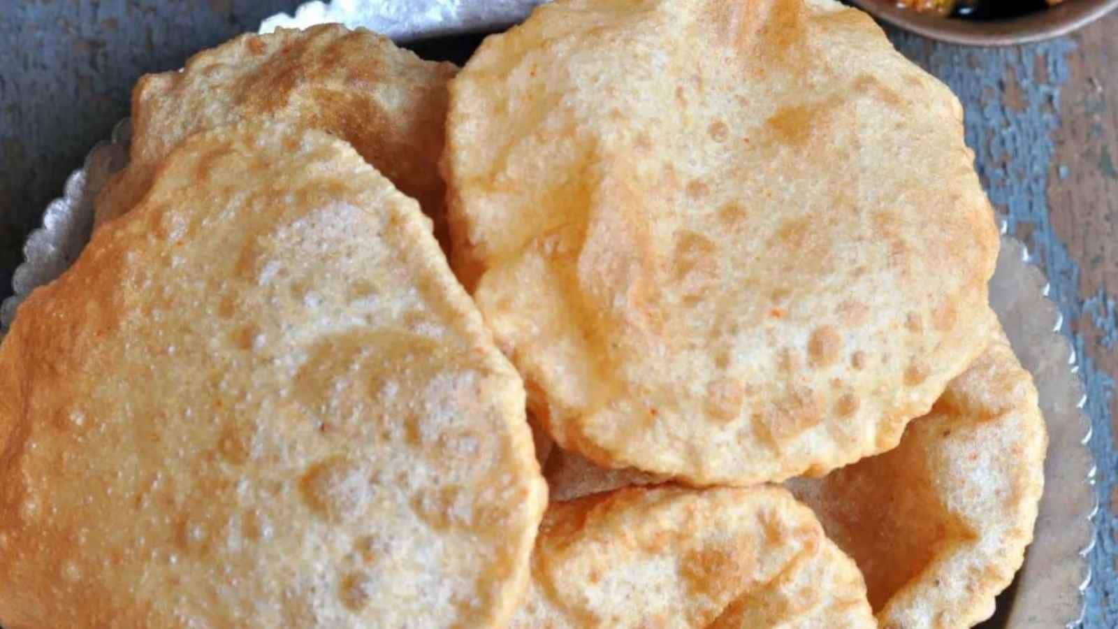 For delightful, light crispness, mix one to two tablespoons of fine semolina (sooji) into two cups of wheat flour. Optional carom seeds (ajwain) enhance digestion and pair wonderfully with rich chickpea or spicy potato curries.