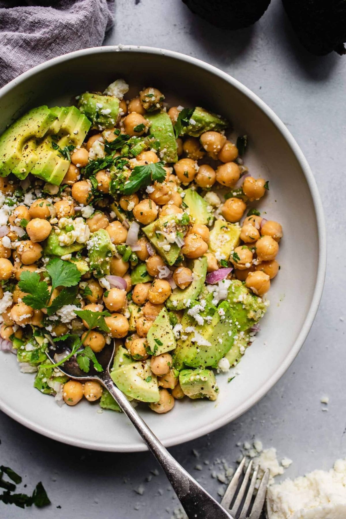 Avocado &amp; Chickpea Sundal: Boiled kabuli chana and avocado pieces are tossed with curry leaves, mustard seeds, pinch of asafoetida, and fresh coconut. This South Indian temple-style preparation offers an effortless fiber-rich, high-protein side dish packed with clean flavours.