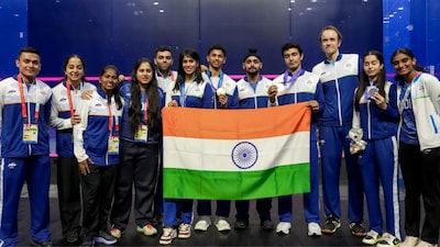 Nagoya: India's Anahat Singh, Abhay Singh, Joshna Chinnapa, Velavan Senthilkumar and others pose for photographs after winning silver medal and Bronze medals in the women�s, men's singles and mixed doubles Squash events in the ongoing 20th Asian Games, in Nagoya, Japan, Sunday, Sept. 27, 2026. (PTI Photo/Arun Sharma)