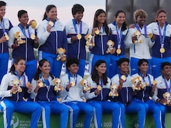 Gold Medalist team India pose on the podium after the women's gold medal T20 cricket game between India and Sri Lanka at the Asian Games in Nisshin, Japan, Tuesday, Sept. 22, 2026. (AP Photo/Mark Baker)