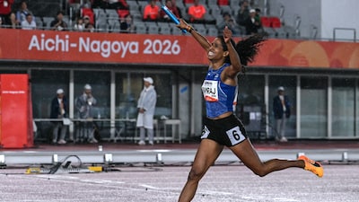 India's Vithya Ramraj celebrates winning the women's 4x400m relay final during the 2026 Asian Games at Nagoya City Mizuho Park Athletic Stadium in Nagoya, Aichi Prefecture on September 29, 2026. (Photo by MOHD RASFAN / AFP)