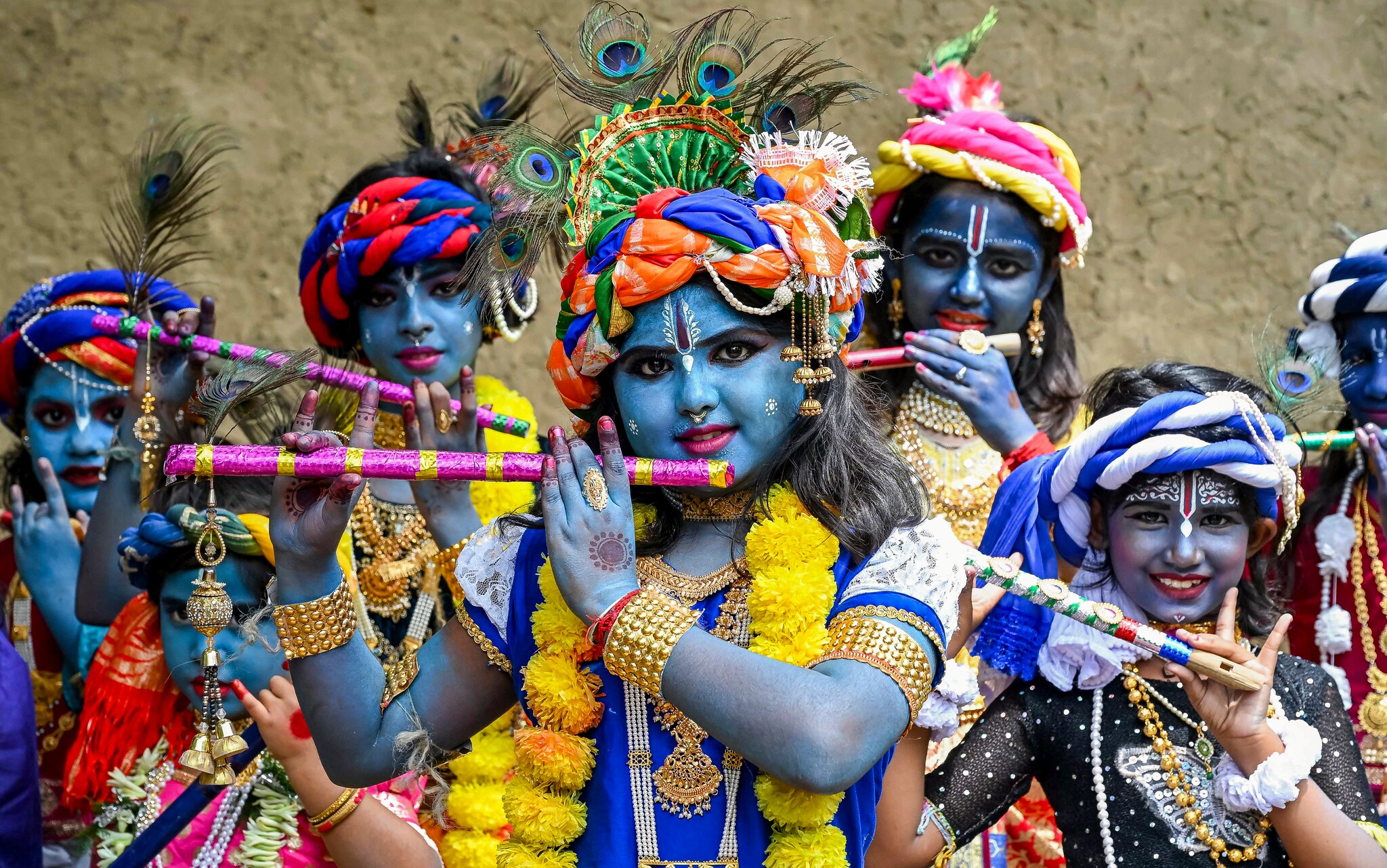 Children pose for a photograph as they celebrate Janmashtami. (PTI Photo) Children pose for a photograph as they celebrate Janmashtami. (PTI Photo)
