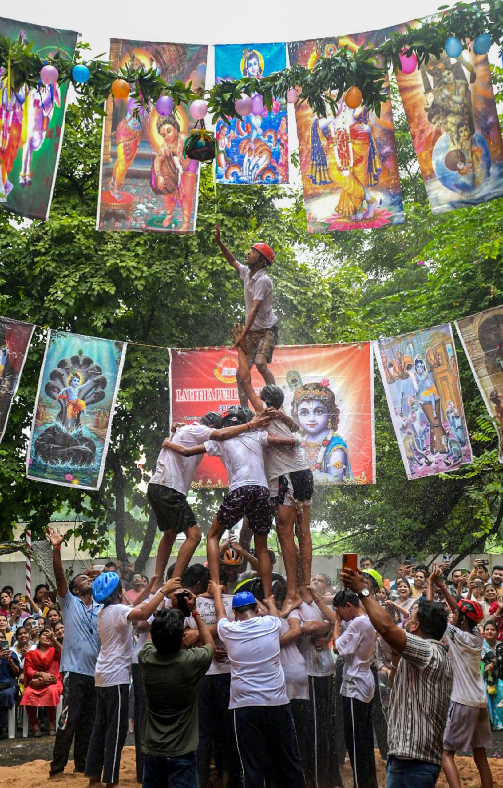 A school student breaks ‘dahi handi’ during a celebration at a school on the eve of Janmashtami festival in Nagpur, Maharashtra. (PTI Photo) A school student breaks ‘dahi handi’ during a celebration at a school on the eve of Janmashtami festival in Nagpur, Maharashtra. (PTI Photo)
