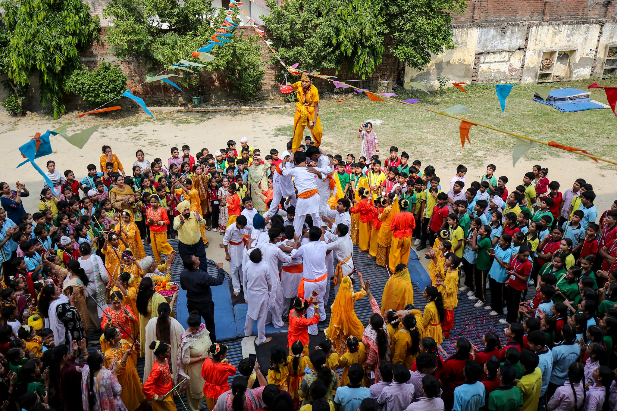 A child dressed as Lord Krishna breaks ‘dahi handi’ during celebration on the eve of Janmashtami festival in Amritsar, Punjab. (PTI Photo) A child dressed as Lord Krishna breaks ‘dahi handi’ during celebration on the eve of Janmashtami festival in Amritsar, Punjab. (PTI Photo)