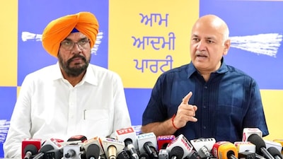 AAP Punjab in-charge Manish Sisodia addresses a press conference alongside the party's state chief spokesperson Kuldeep Singh Dhaliwal in Chandigarh. (Image: Aam Aadmi Party)