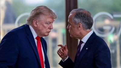 US President Donald Trump speaks with Canadian Prime Minister Mark Carney. (IMAGE: REUTERS FILE) 