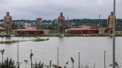 Prerna Sthal park partially submerged in rainwaters, near the statues of Bharatiya Jana Sangh (BJS) founder Syama Prasad Mookerjee, party leader Deendayal Upadhyaya and former prime minister Atal Bihari Vajpayee, in Lucknow. (IMAGE: PTI)