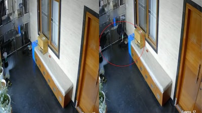 The purported incident was caught on CCTV, showing the accused driver pouring urine at the woman's doorstep (Image credit: X/@siriishasb04)