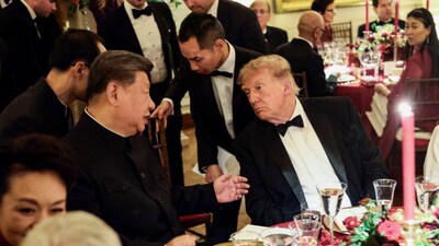 Chinese President Xi Jinping and US President Donald Trump speak during a state dinner at the White House in Washington, DC. (Source: Reuters)
