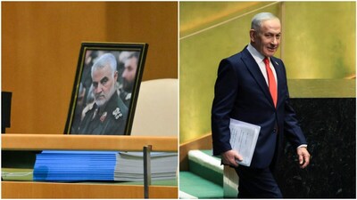 A picture of late Iranian Revolutionary Guard Corps commander Qassem Soleimani sits on the desk of the Iranian delegation. (AFP photo)