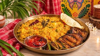Missing the familiar flavours of Durga Puja? Whip up a comforting pot of Bengali bhoger khichuri with this easy recipe.