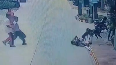 The footage shows the dog attacking a woman and her pet as several people struggled to intervene. (Image: X)