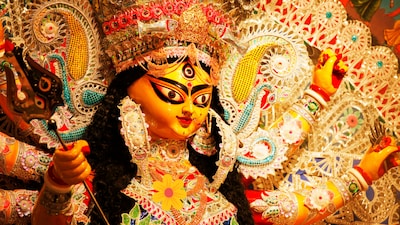 From the legend of Lord Rama’s worship to the symbolism of the lotus, explore the stories behind Sandhi Puja’s sacred offerings