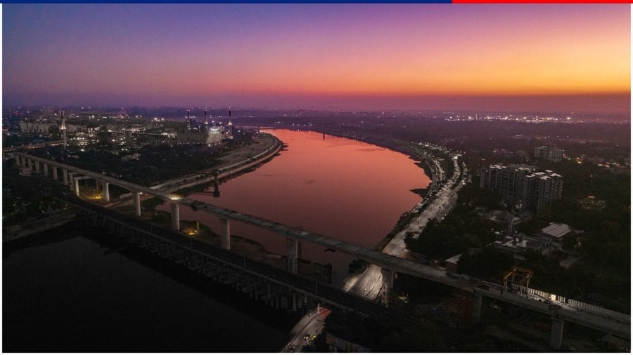  It Stretches 480 Metres Across The Sabarmati RiverThe bridge measures 480 metres in length and crosses the Sabarmati River in Gujarat. According to NHSRCL, it is located between the Sabarmati and Ahmedabad bullet train stations. The structure is approximately 1 km from Sabarmati station and 4 km from Ahmedabad station. Its completion marks an important step in building the infrastructure required for the high-speed rail service.