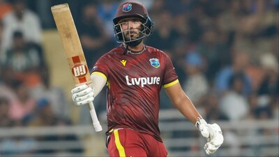 Amir Jangoo celebrates after scoring 50 in 3rd ODI against India. (Picture Credit: Creimas)