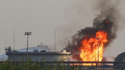 Flames burn at a facility belonging to Saudi oil giant Aramco south of Riyadh on October 3. (AFP photo)