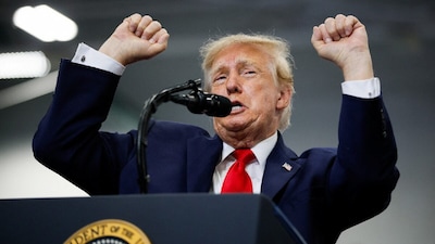 US President Donald Trump gestures on stage as he speaks at the Curtis D. Menard Memorial Sports Center in Wasilla, Alaska, US. (IMAGE: REUTERS)