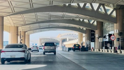 Cars drive past the gates of King Khalid International Airport in Riyadh on September 19, 2026. (AFP file photo)