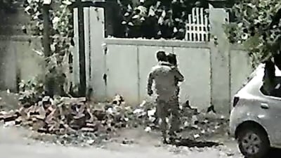He was also threatened with a fine if he did not pick up the garbage (Image: X/@GreaterNoidaW)