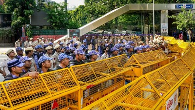 Security heightened near Janpath metro station as INDIA bloc MPs move toward Jantar Mantar to hold a sit-in protest against Chief Election Commissioner Gyanesh Kumar, in New Delhi. (IMAGE: PTI)
