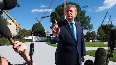 US President Donald Trump speaks to reporters before boarding Marine One on the South Lawn of the White House. (Getty Images via AFP)