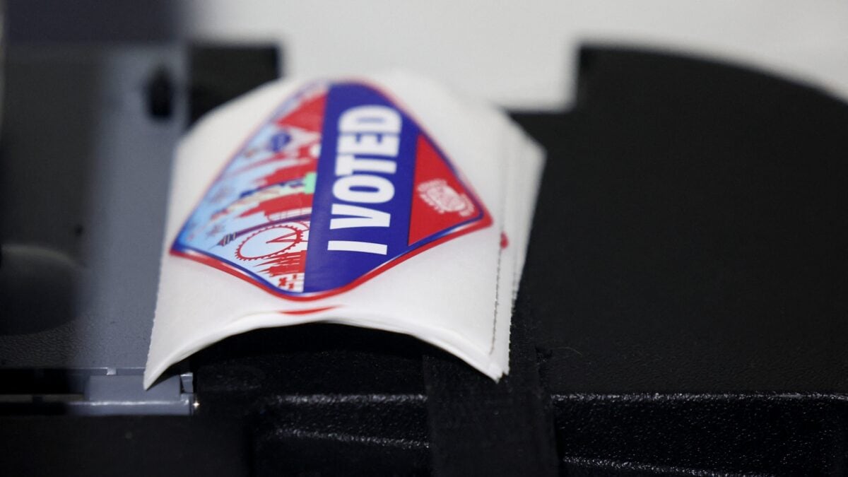 US Justice Dept charges 28 green‑card holders, including two Indians, with election fraud