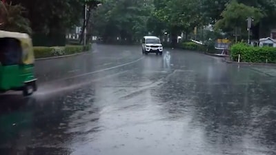 Rain lashes parts of Delhi. Visuals from Connaught Place Inner Circle. (PTI)