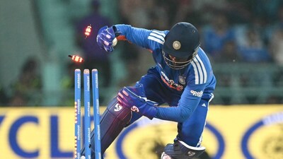 Sanju Samson runs out West Indies Shimron Hetmyer during the first T20I (Picture credit: AFP)