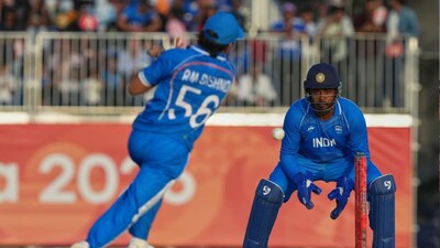 Sanju Samson in wicket keeping action during the gold medal cricket match between India and Pakistan at the Asian Games (Picture credit: AP)