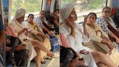 A woman was spotted wearing a bathrobe and applying eye patches inside a train (Image-X/@Haramiparindey)