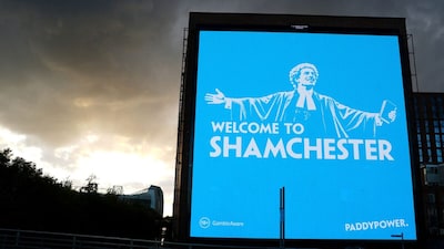 A general view of a billboard featuring a Paddy Power advert that reads 'Shamchester', in Manchester (Picture credit: AP)