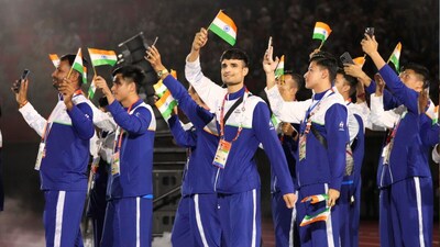 Athletes from India march into the closing ceremony for the Asian Games (Picture credit: AP)