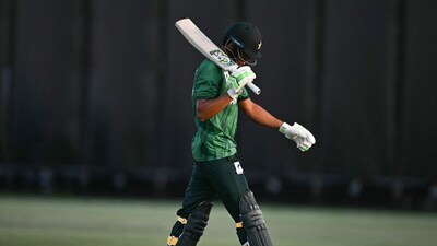 Hasan Nawaz walks off the field following his dismissal at 98 runs during the men's cricket final match between Pakistan and India during the 2026 Asian Games (Picture credit: AFP)