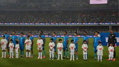 India's players stand for the national anthem during their international friendly against Brazil (Picture credit: AP)