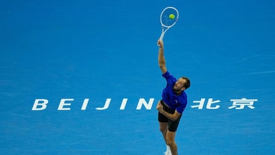 Daniil Medvedev serves to Novak Djokovic, of Serbia, during the men's single semi-final match at the China Open (Picture credit: AP)