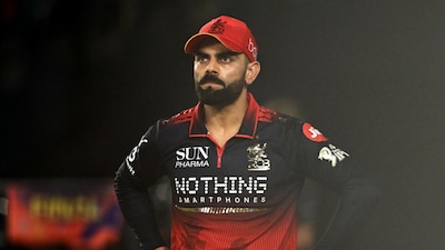 Royal Challengers Bengaluru's Indian cricket player Virat Kohli looks on during the 2026 Indian Premier League (IPL) T20 final match between Gujarat Titans and Royal Challengers Bengaluru at the Narendra Modi Stadium in Ahmedabad on May 31, 2026. (Photo by Shammi MEHRA / AFP) 