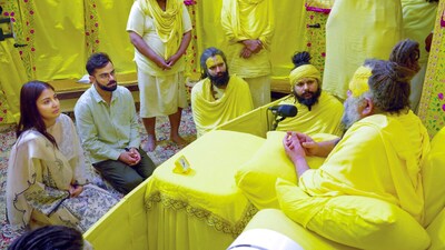 Virat Kohli and his wife Anushka Sharma meeting Premanand Ji in 2025. (PTI Photo)