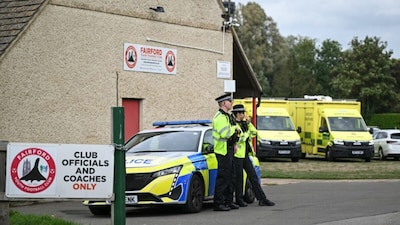 Police stand guard at the Fairford Youth Football Club near RAF Fairford base. (AFP photo)