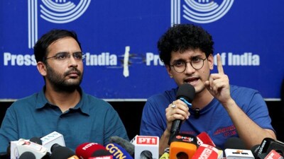 Saurav Das, chief spokesperson of the Cockroach Janta Party (CJP), speaks next to Ashutosh Ranka, co-convenner of CJP. (Reuters file photo)