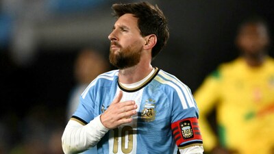 Lionel Messi celebrates scoring his team's third goal. (AFP Photo)