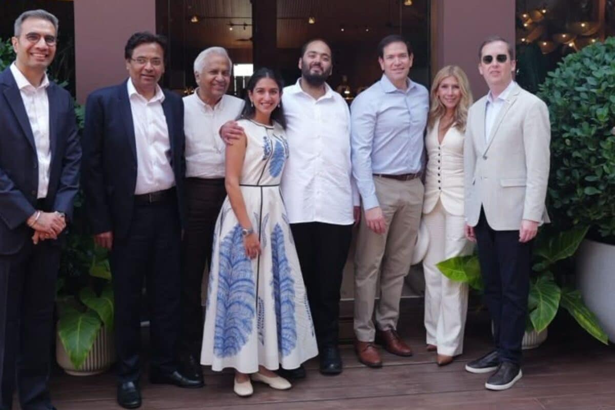 Radhika Merchant Poses With Marco Rubio In A Giambattista Valli Floral Midi And Ballet Flats
