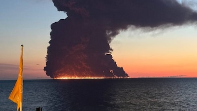 Videos and images from Sochi showed bright flames burning offshore as thick black smoke rose into the sky. (Image via X)