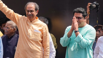 Shiv Sena (UBT) chief Uddhav Thackeray and MNS chief Raj Thackeray during the 'Virat Garjana Morcha' rally over alleged SIR discrepancies. (PTI)